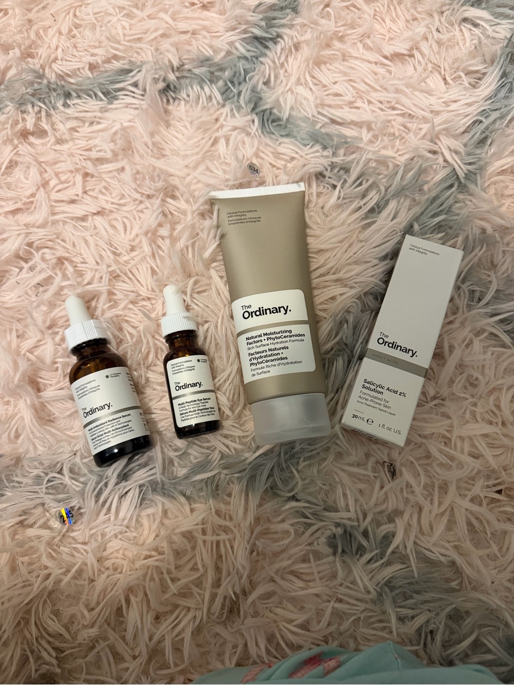 The Ordinary skincare set - amber, beige, white
